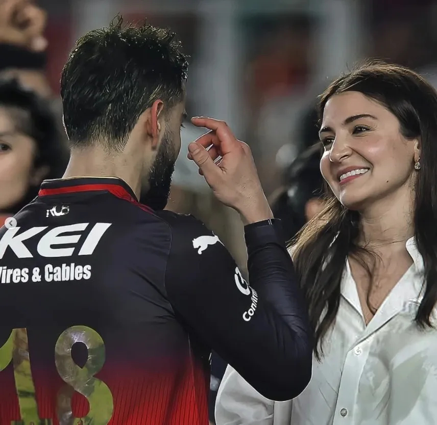 What Historic Moment Unfolded at the Narendra Modi Stadium as Anushka Embraced Virat in RCB's First IPL Win?
