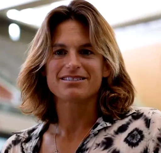 Why is Amelie Mauresmo Defending the French Open's Night Session Policy?