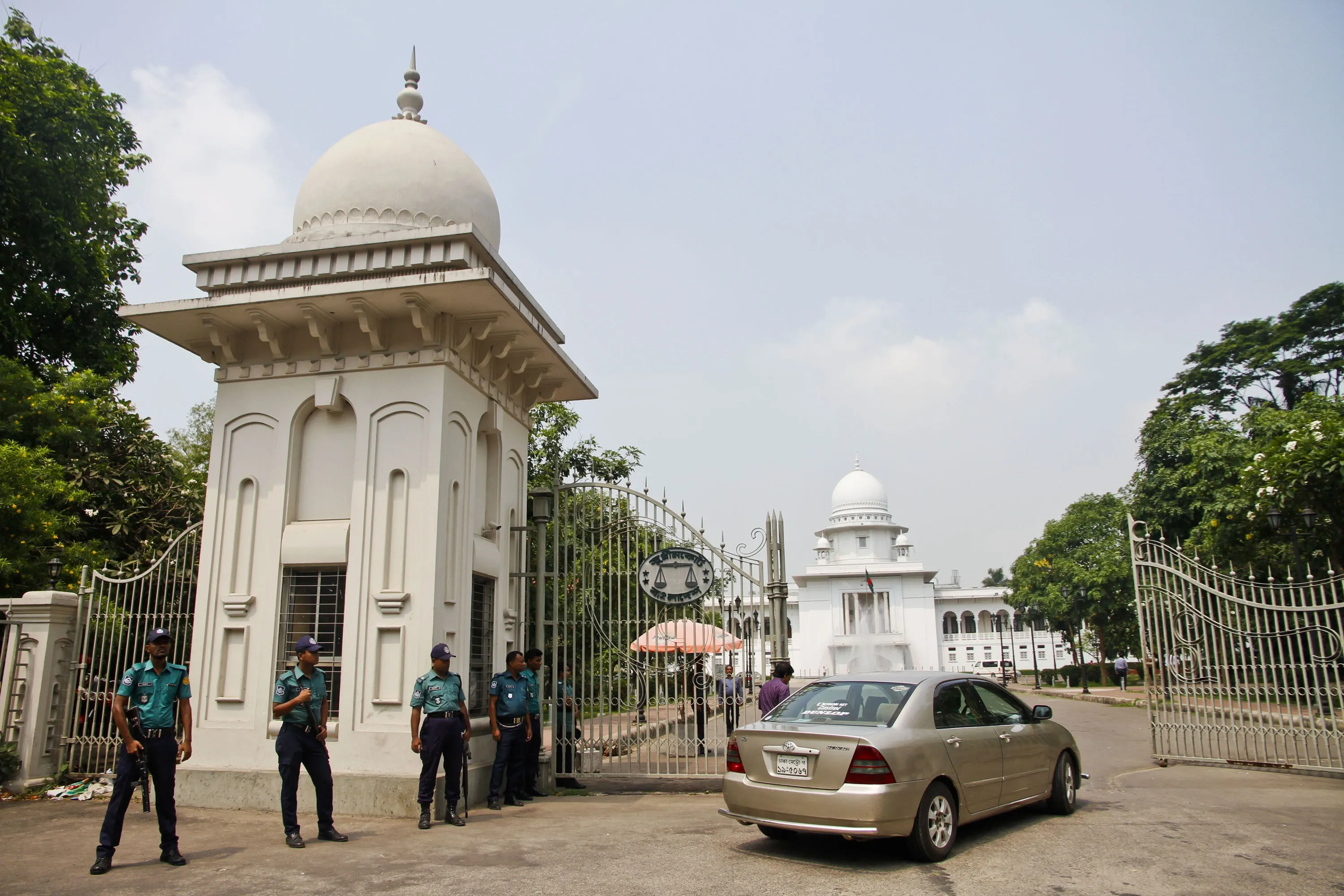 Has a travel ban been imposed on Sheikh Hasina's former military secretary?