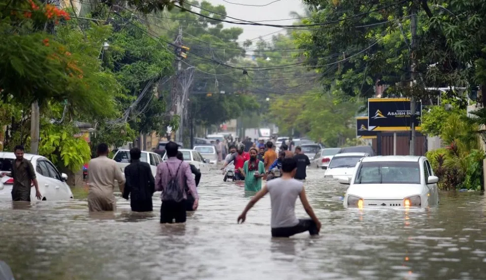 What led to the tragic deaths of eleven in Karachi due to rain?