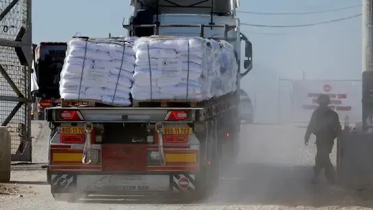 Humanitarian Aid Trucks Begin Arriving in Gaza from Egypt as Ceasefire Commences