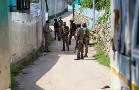 What Led to the Raids in Srinagar Related to the 1990 Murder of a Kashmiri Pandit Woman?