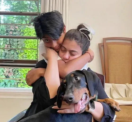 Kajol Celebrates Her Dog's 2nd Birthday with a Touching Photo Featuring Her Son and Their Puppy