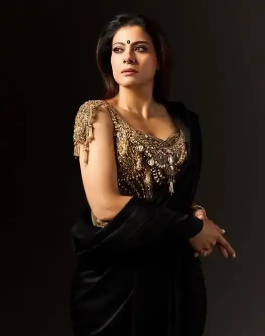 Why does Kajol admire her husband Ajay Devgn's dedication as a producer?