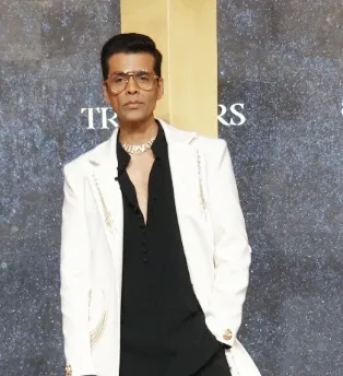 How Did Karan Johar Reveal Uorfi Javed and Nikita Luther's Strategy to Win The Traitors?