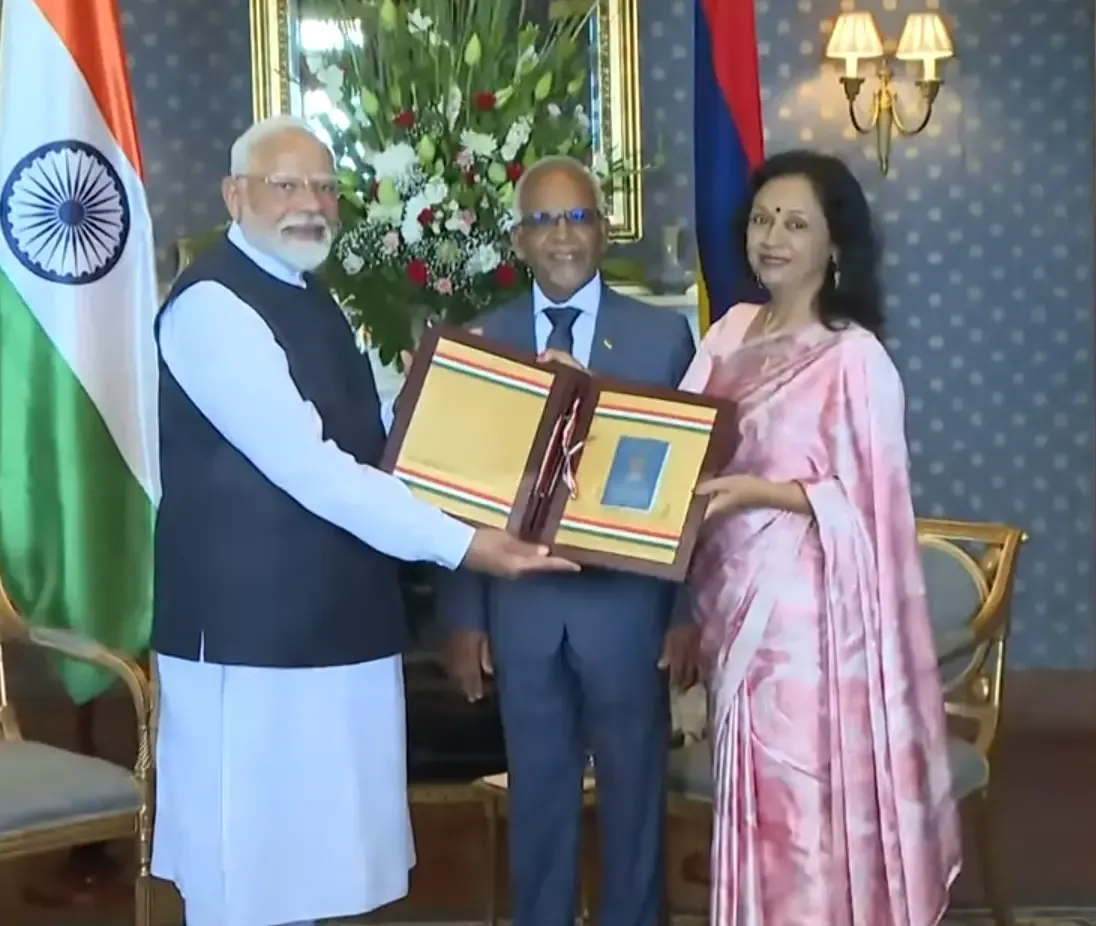 PM Modi Presents OCI Cards to President Gokhool and First Lady of Mauritius