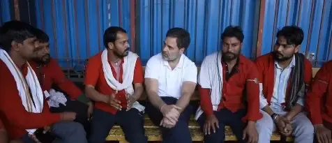 Rahul Gandhi Engages with Coolies at NDLS, Commits to Advocate for Their Rights