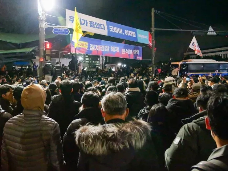 South Korea: Citizens Outside National Assembly Cheer as Martial Law is Lifted