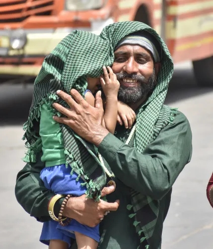 Individuals Protect Themselves from Heat in Amritsar
