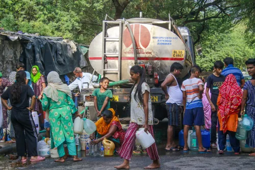 Residents Gather Water During a Heatwave in New Delhi