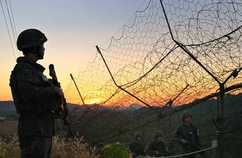 South Korea's military fires warning shots at North Korean soldiers as they cross military demarcation line
