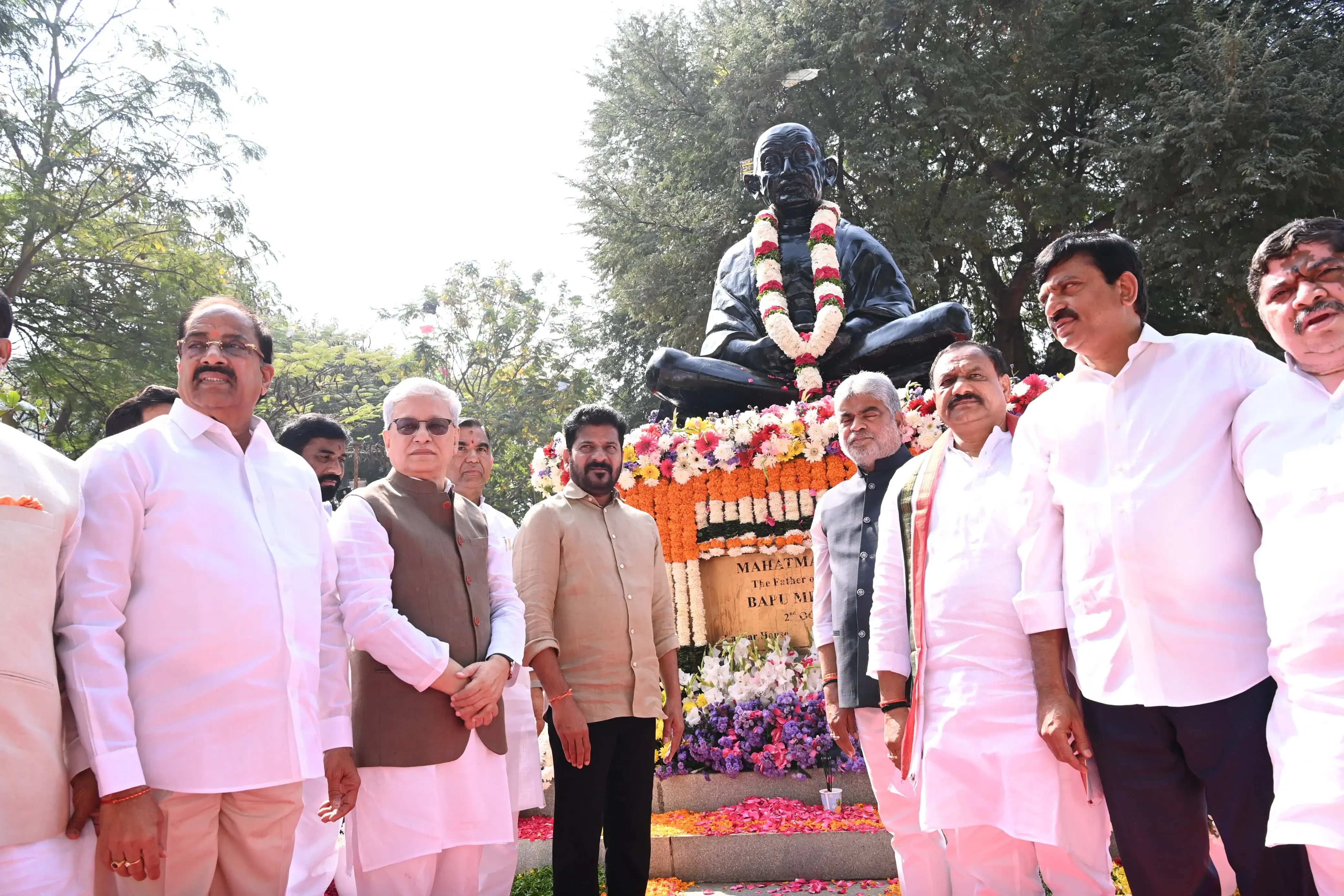 Telangana Officials Honor Mahatma Gandhi at Bapu Ghat