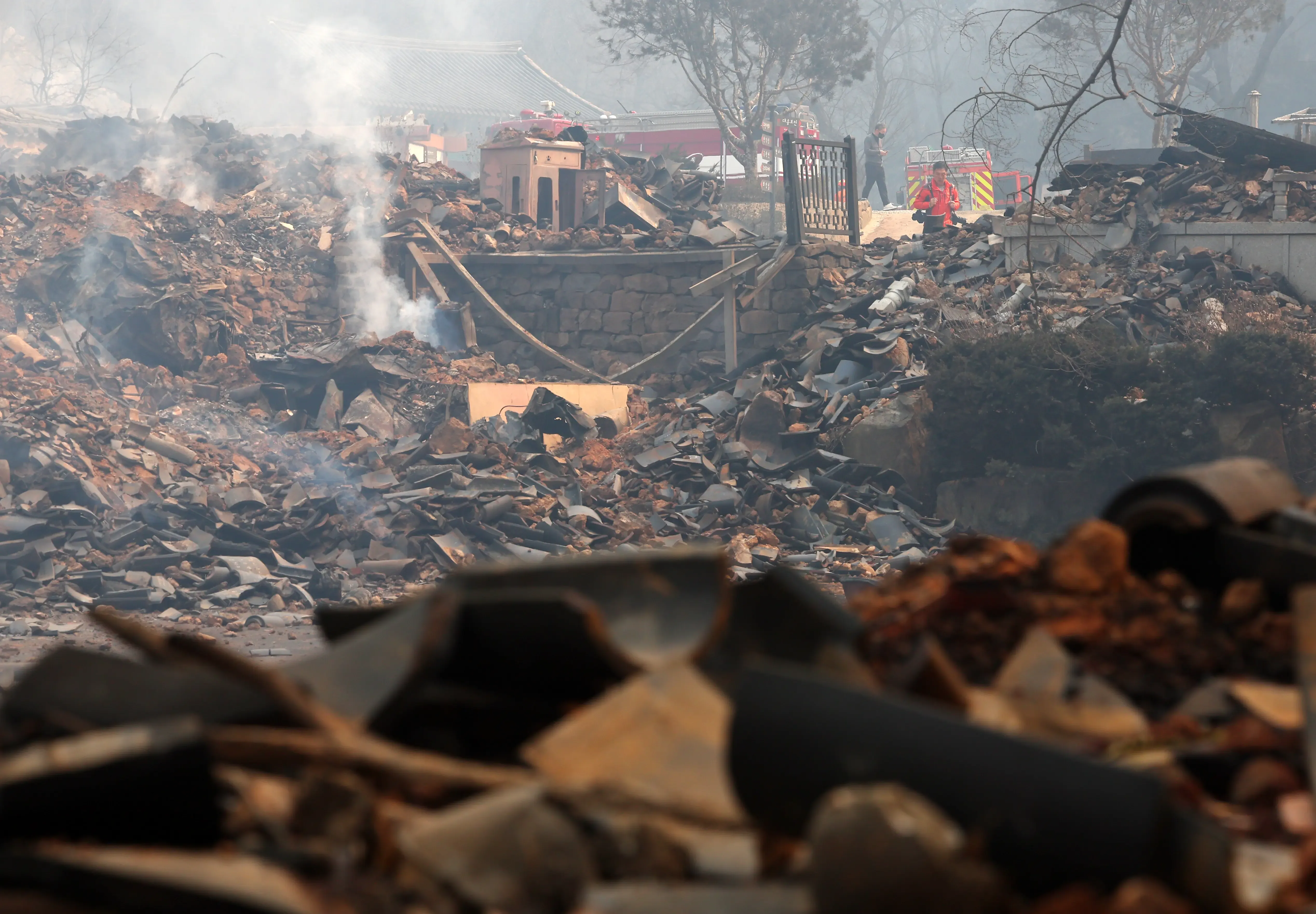 Wildfires spread, fanned by strong winds, in South Korea's southeastern region as death toll climbs to 24