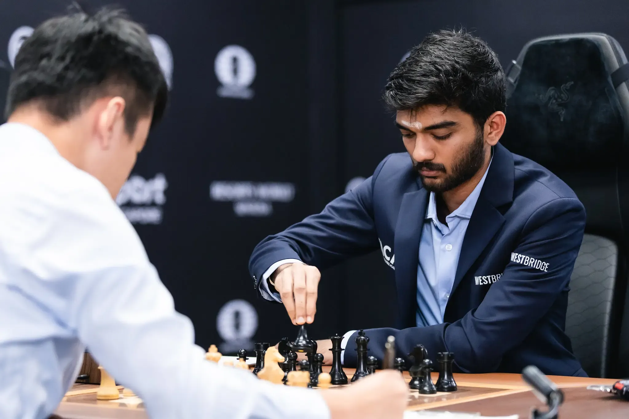 World Chess Championship: Gukesh Takes the Lead as Ding Succumbs to Pressure in Game 11