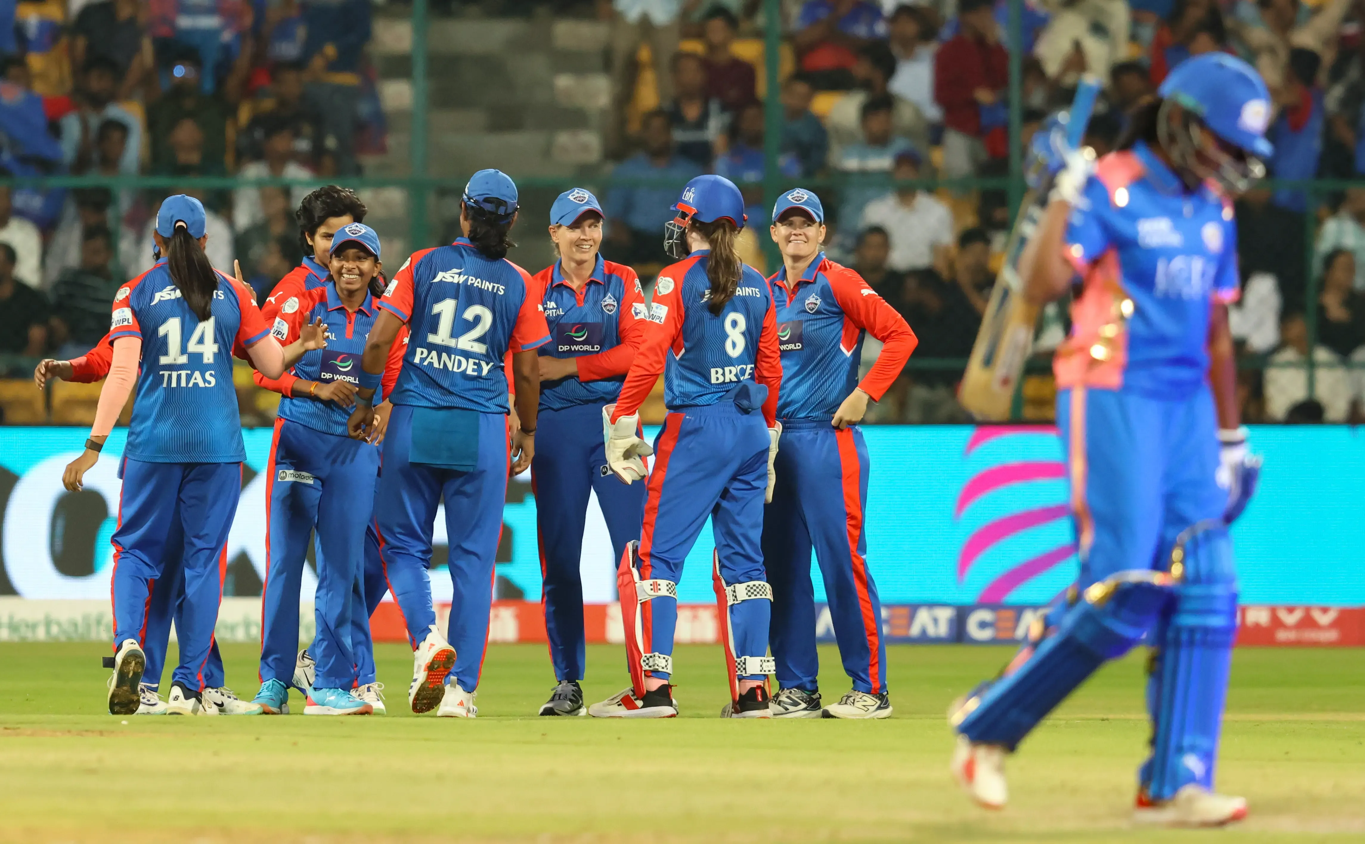 WPL 2025: Jonassen and Mani Lead Delhi Capitals to Limit Mumbai Indians to 123/9